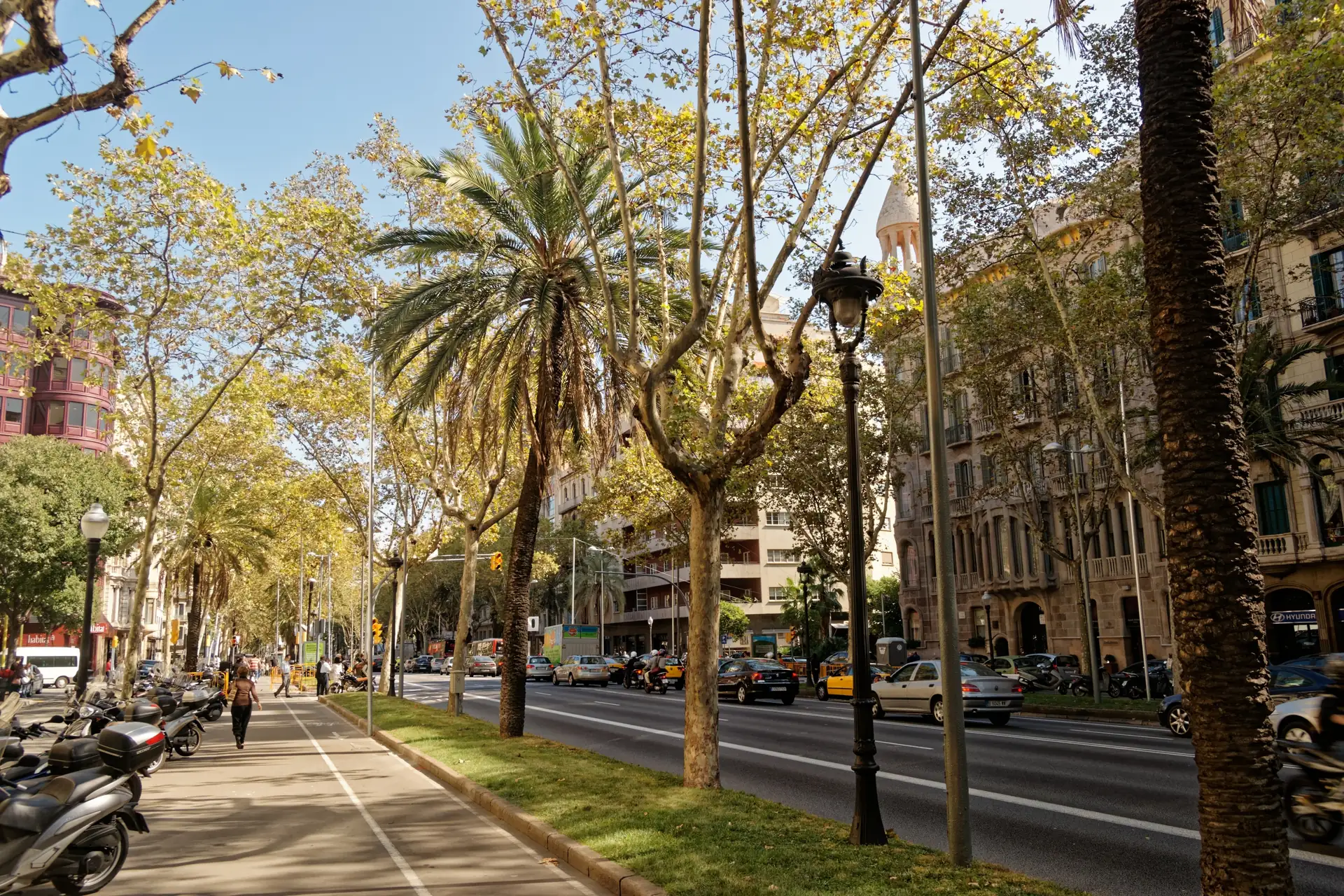 Barcelona's Avinguda Diagonal with traffic and parked cars